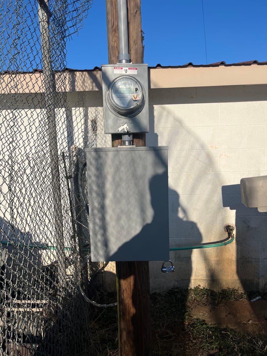 Residential exterior meter base and service equipment installation