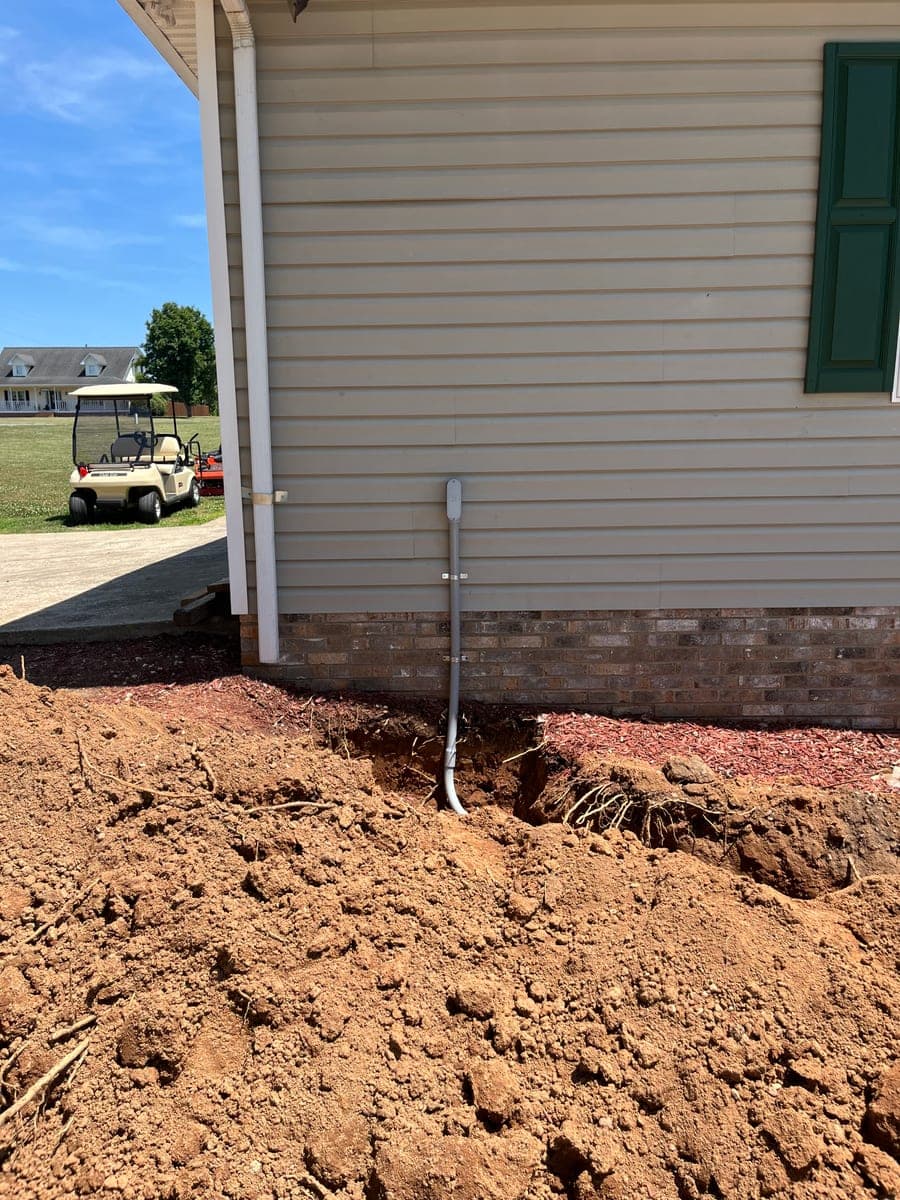 Electrical conduit running through a residential trench